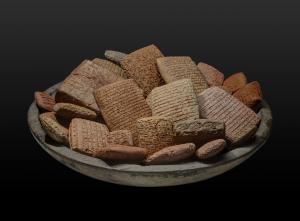 cuneiform clay tablets in a bowl