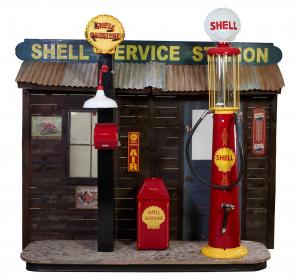 Life size Shell Oil filling station diorama, by McLaren Classic Restorations, in the late-1920s/’30s style, featuring a period Wayne 615 visible gas pump. Estimate: $5,000-$10,000.
