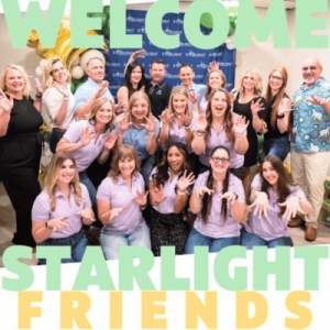 A large group of people gather in a cheerful setting, celebrating with "Welcome Starlight Friends" text overlay in vibrant colors.