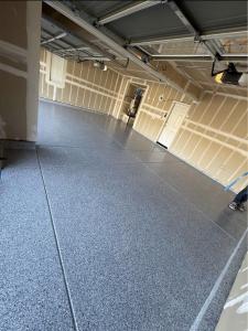 Epoxy floor being installed in a Sacramento space by Sacramento Valley Flooring