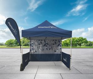 A branded tent shown outside.
