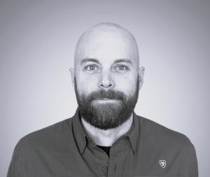 Corporate Headshot of Ryan Gibson.