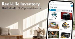 Image of home living room with large mobile screen showing Itemtopia Home Inventory and Work Inventory application.