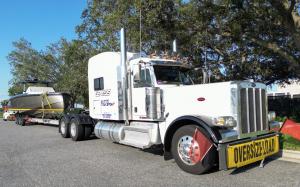 Luxury yacht in transit with Genesis Exotic Transport, illustrating professional, door-to-door nationwide boat shipping services.