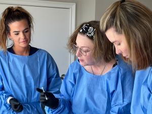 Small group of students gathered for training