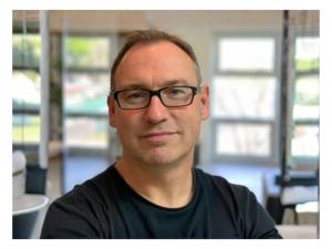 Picture of David Boehme, founder and CEO of VBO Tickets at his office