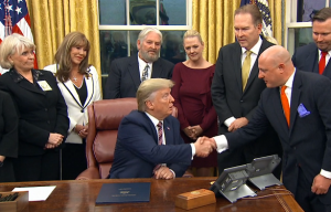 President Trump shaking hands with Animal Wellness Action's Executive Director  Marty Irby at last night's signing ceremony in the Oval Office