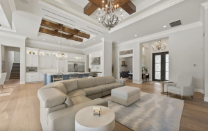 Luxury interiors with wide-plank Legno Bastone flooring, designer furnishings and refined architectural finishes.