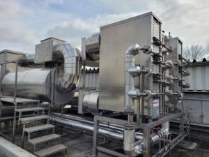 A biogas plant in Northern Germany is shown with the BOMAT heat exchange system