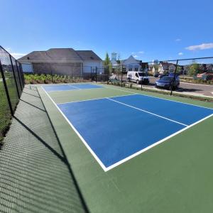 Pickleball court surfacing in HOA community