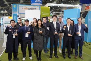 Group photo of representatives from 10 winners and 5 media outlets