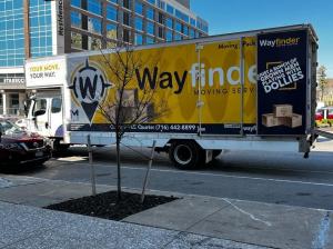 Wayfinder Moving Services van and trucks displaying company branding - "Your Move. Your Way."