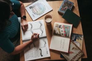 Christine Zell plans her homeschool week using Rabbit Trails Homeschool materials and real books such as The Lion, the Witch, and the Wardrobe and varioius picture books.