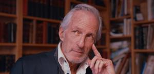 Henrick Johansson resting face on hand