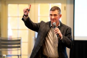 Carl J. Cox, CEO and founder of 40 Strategy and 40 Accounting, addresses attendees during the 2025 program.