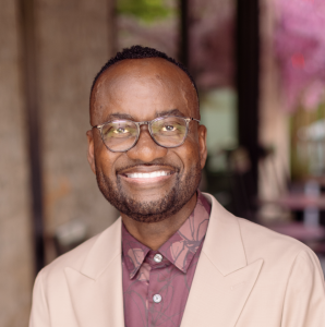 Portrait of Anthony E. Tuggle, senior executive, board leader, and Founder and Chief Executive Officer of TAG US Worldwide