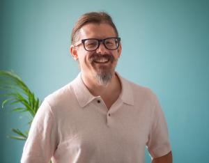 Headshot of Dan Jarratt, vice president of data science at Education Analytics, discussing the importance of interoperable, standards-based public data infrastructure for evaluating and governing AI in K–12 education.