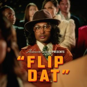 Artwork for Ashwin Gane’s single “Flip Dat” featuring a cinematic visual theme, celebrating its rise to No. 1 on the UK Music Week Black Music Chart.
