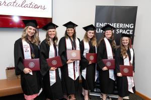 Oklahoma City Community College nursing program graduates hold degrees.