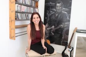 Jewish National Fund-USA National Campaign Director, Sharon Joy, pictured with an image of Bruce Springsteen on her wall
