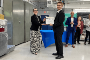 Michael-Anthony Kline receives recognition during the Skill Up for Manufacturing graduation at Vinal Technical School in Middletown, Connecticut.