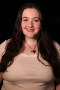 Makendra Mowad, a Confidia Cares scholarship recipient, poses for a student headshot while attending Sacred Heart University.