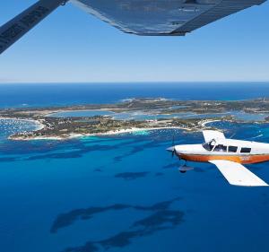 Piper Cherokee flying to Rottnest Island