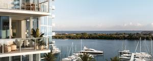 Exterior rendering of waterfront Terrace of Luna at Marina Pointe luxury condominium