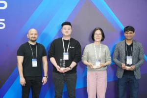 Malaz Madani, Co-founder of Arageek, poses for a commemorative photo with representatives of award-winning companies at the COMEUP Global Media Awards 2025.