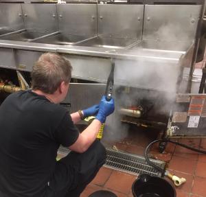 Steam-based deep cleaning for commercial kitchen environments