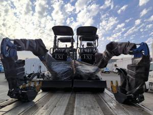 TERROR XI Mini Excavators against the blue skyline