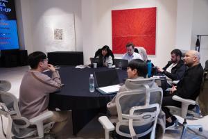 Minsoo Kim, Assistant Manager at Warp Solution, conducts interviews with media representatives from the United States, France, the United Arab Emirates, Taiwan, and Vietnam during the Global Media Meetup.