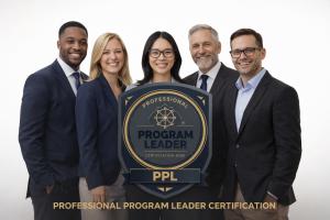 Five professionally dressed business professionals standing together and smiling, symbolizing leadership and collaboration. A Professional Program Leader (PPL) Certification badge appears in front, representing enterprise program leadership.