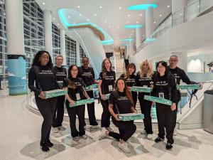 Photo of a group of people staffing an event.