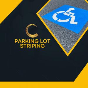 ADA handicap parking space with fresh blue paint showing professional parking lot line striping in Columbus, Georgia.