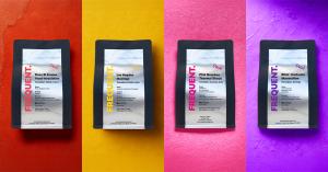 Four bags of specialty decaf coffee from Frequent Coffee displayed on colorful backgrounds.