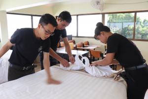 EGBOK students in training, making bed