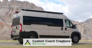 Custom Coach Creations logo with the Voyager LE Class B RV on display in a nature background, depicting our off-grid camping capabilities.