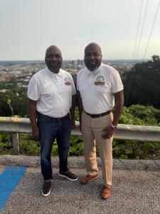 Ivory LeShore III and William A. LeShore leadership team members of Furnace Chicken Festival, pictured in Birmingham following a media interview in 2025.
