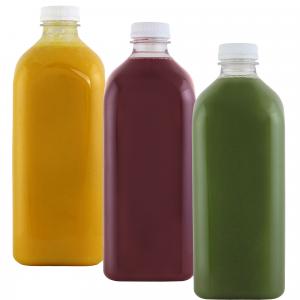 Juice bottles from Arden's Garden photographed on seamless white background. These will further be used to create mock ups of various products they offer