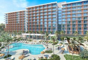Hyatt Centric Cayman depicted with Pool Deck and Planned Hotel in Background