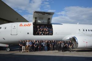 Photo of the KF Aerospace crew with the finished Air Inuit Boeing 737-800 Combi plane