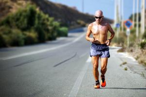 Man running outdoors, symbolizing sustainable fitness and longevity strategies promoted by beyondMD.