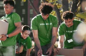 Group of volunteers in green.