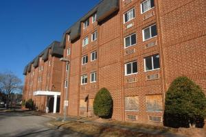 Boarded Up Picture of Stewart Manor_Vacant 99-Unit Senior Tower