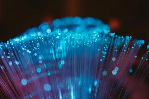 Image of fiber optic strands with blue light