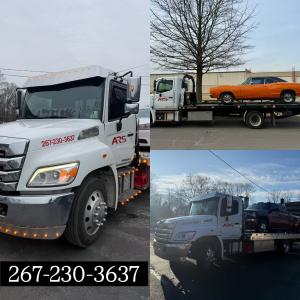 Professional ARS Towing flatbed truck providing 24/7 emergency roadside assistance and vehicle recovery services in Southampton and Bucks County, PA.