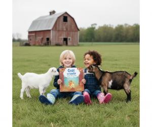 Two children showing Scout's Rainy Day book with goats looking on.