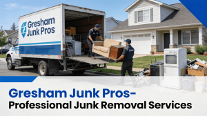 Professional junk removal crew loading furniture and debris into truck in Gresham - Gresham Junk Pros providing efficient residential junk hauling services with branded truck and uniformed workers