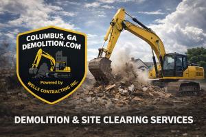Excavator performing demolition and site clearing work.